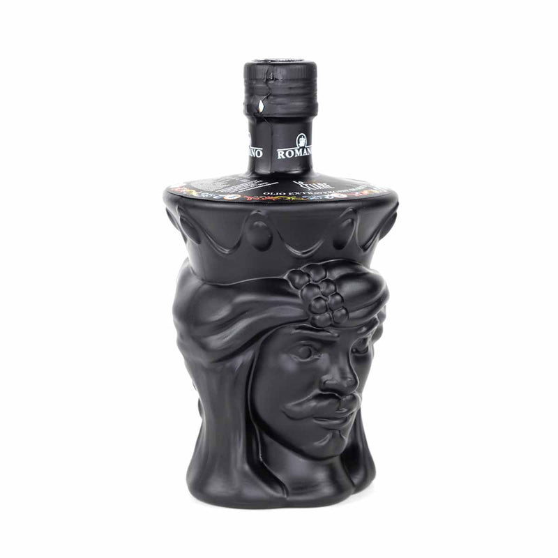 The Romano Frantoio Testa di Moro Le Sciare Extra Virgin Olive Oil (0.5L) comes in a matte black, man-head-shaped bottle with a mustache, headscarf, crown, and ornate cap—an elegant way to showcase Sicilian olive oil.