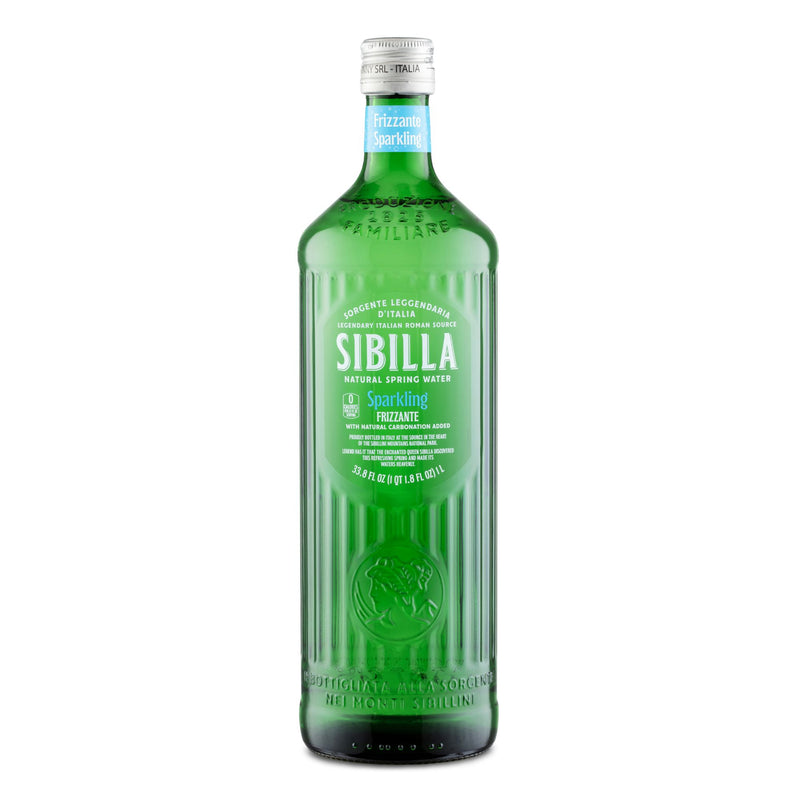 A 1L Sibilla Italian Sparkling Spring Water in a green glass bottle with vertical ridges, a blue and white ‘Sparkling’ label, and a silver cap.