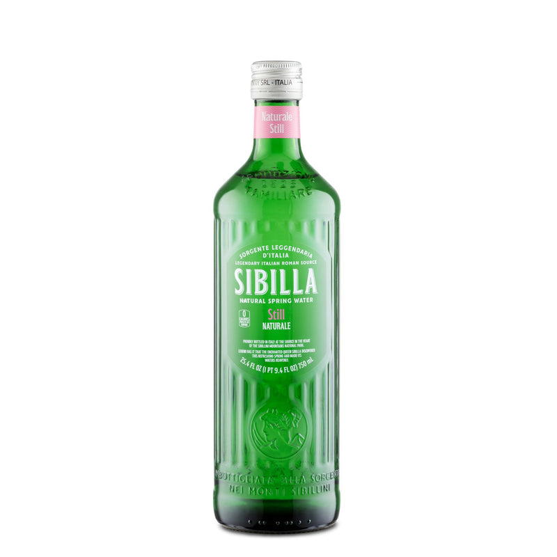 A 750ml green glass bottle of Sibilla Italian Still Spring Water, featuring a pink cap and Italian-labeled branding, is set against a plain white background.