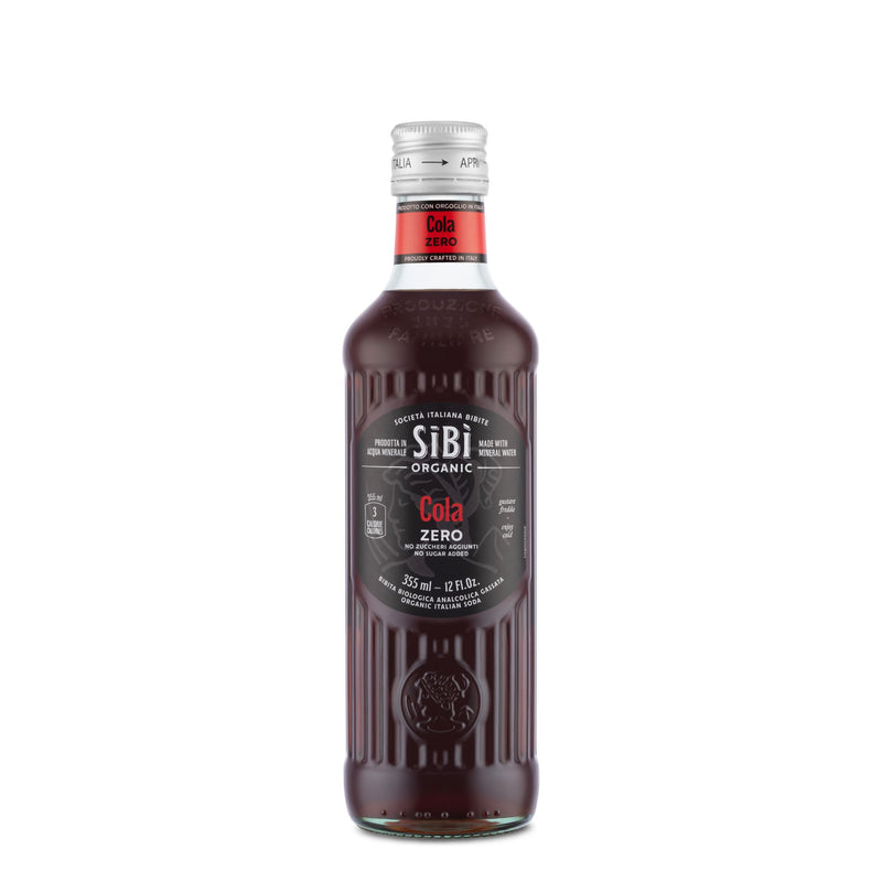 A 355ml glass bottle of Sibilla Organic Italian Cola Zero, a refreshing sugar-free cola with a silver cap and black label with red accents, is shown on a white background.