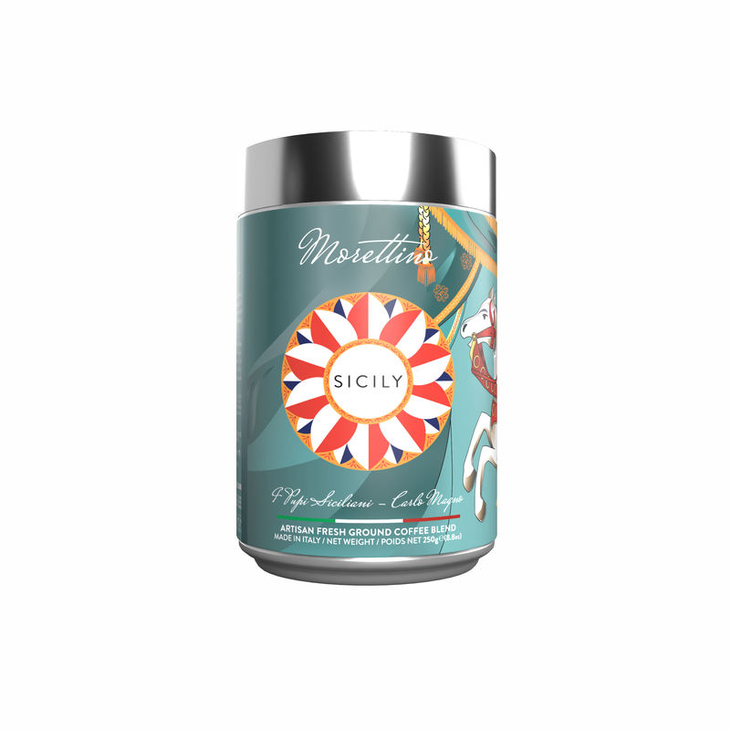Morettino I Pupi Siciliani Carlo Magno Ground Coffee (250g/8.8oz) comes in a limited edition tin with a colorful circular design, a partial carousel horse illustration on teal, and a shiny silver lid.