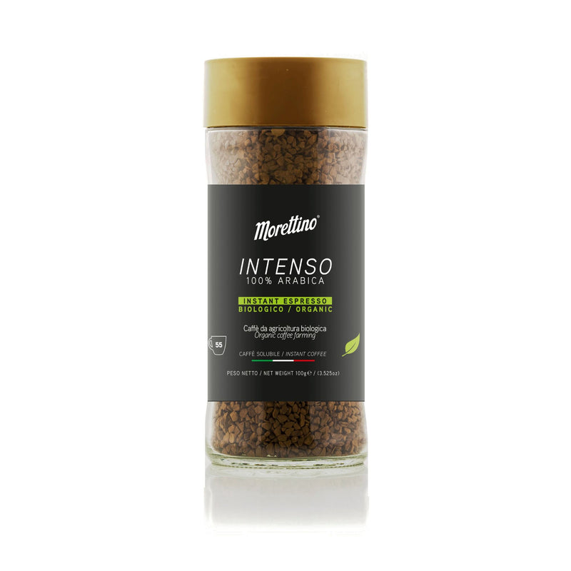 A 100g glass jar of Morettino Organic Instant Coffee Intense, made from 100% Arabica beans.